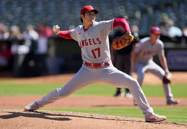 Shohei Ohtani (17) of the Los Angeles Angels pitches against the Oakland Athletics in the bottom of the first inning at RingCentral Coliseum in Oakland, Calif., on Oct. 5, 2022. (Thearon W. Henderson/Getty Images)
