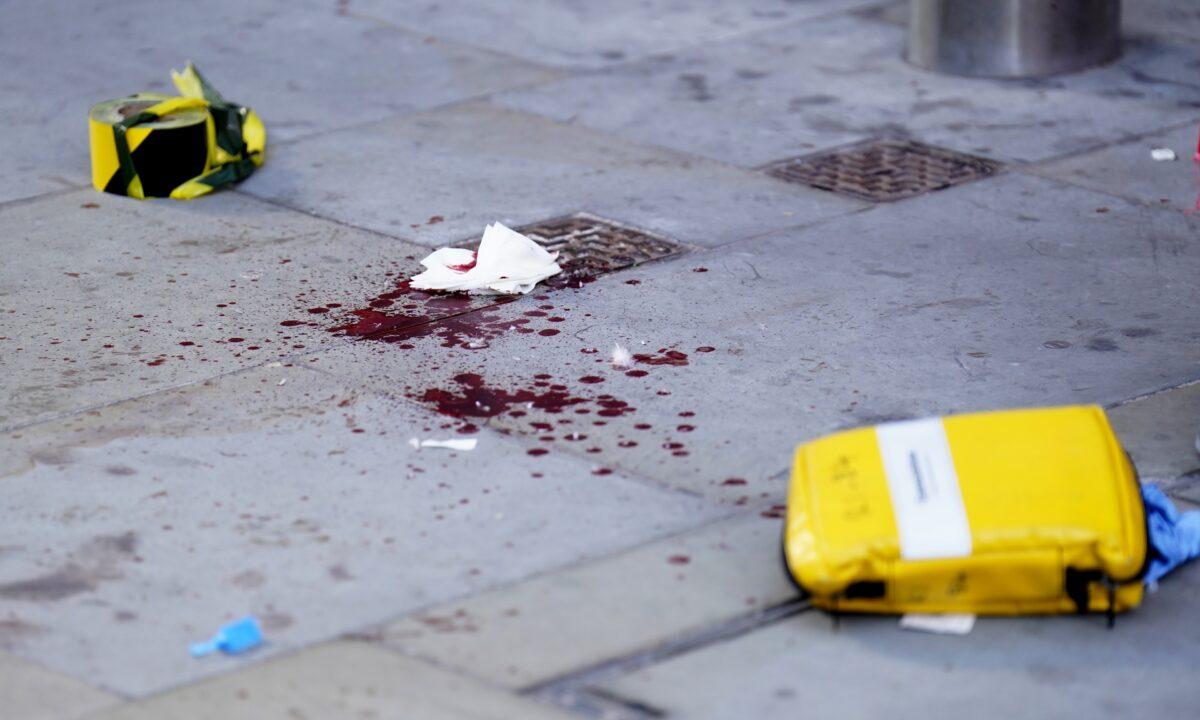 Blood and medical equipment at the scene after three people have been taken to hospital following reports of stabbings at Bishopsgate in London on Oct. 6, 2022. (James Manning/PA Media)