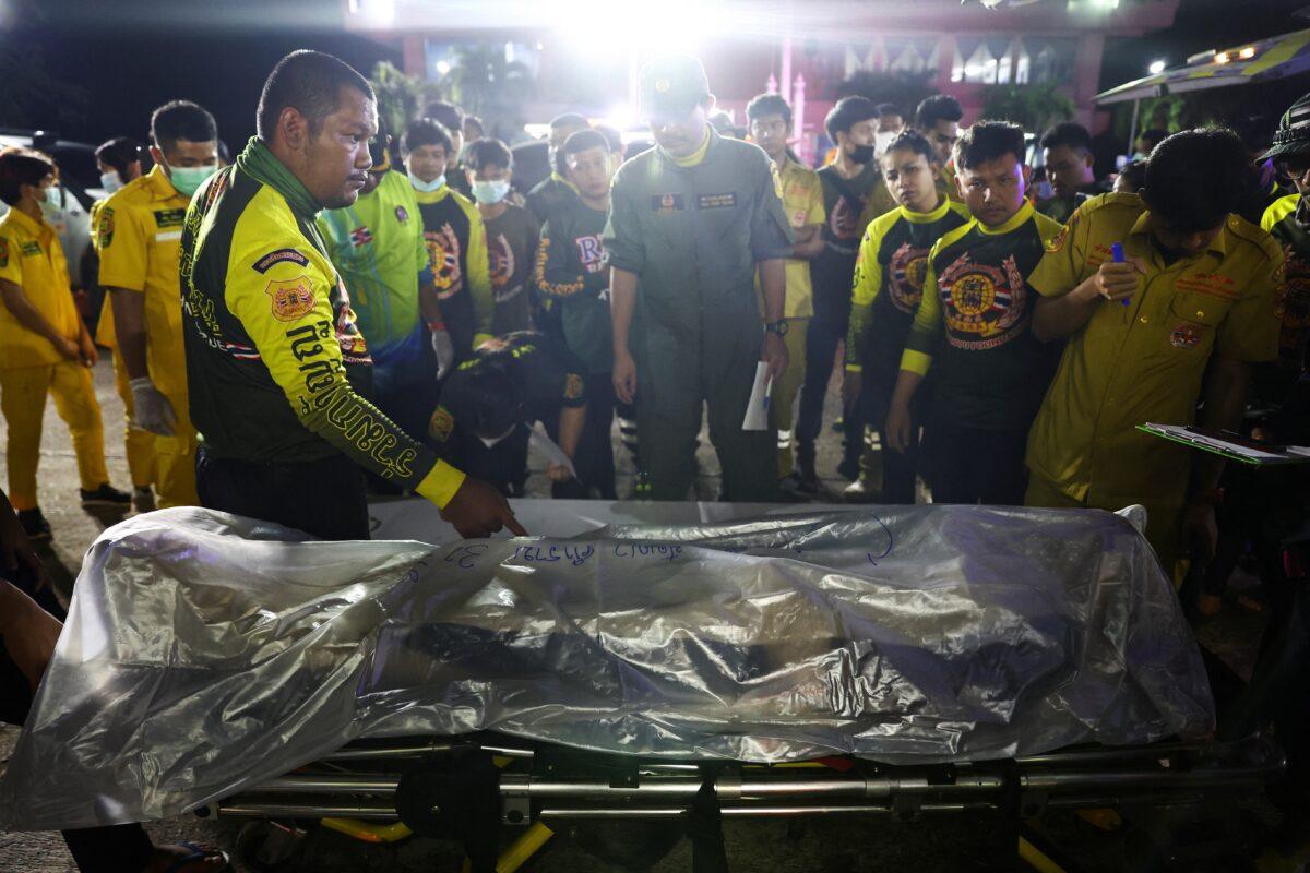 The body of the shooter Panya Khamrap inside a body bag at Na Klang Hospital following a rampage in the town of Uthai Sawan in the province of Nong Bua Lam Phu, Thailand, on Oct. 6, 2022. (Athit Perawongmetha/Reuters)