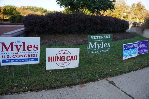 Campaign signs outside the Fairfax County Government Center, a main early voting site, in Fairfax, Va., on Oct. 7, 2022. (Terri Wu/The Epoch Times)