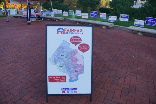A map showing local congressional district changes outside the Fairfax County Government Center, an early voting site, in Fairfax, Va., on Oct. 7, 2022. (Terri Wu/The Epoch Times)