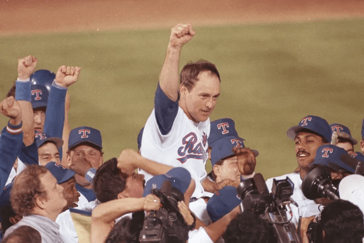 Texas Rangers teammates carry Nolan Ryan off the field in 1991 after his seventh no-hitter, in "Facing Nolan." (Bill Janscha/AP)