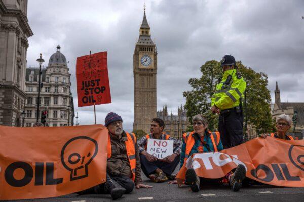 'Just Stop Oil' protesters block traffic in Parliament Square in London, on Oct. 4, 2022. (Dan Kitwood/Getty Images)