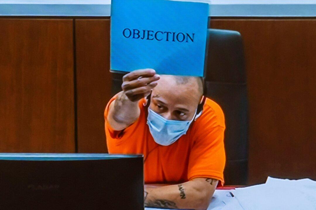 Man Accused in Parade Deaths Removes Shirt, Interrupts Judge