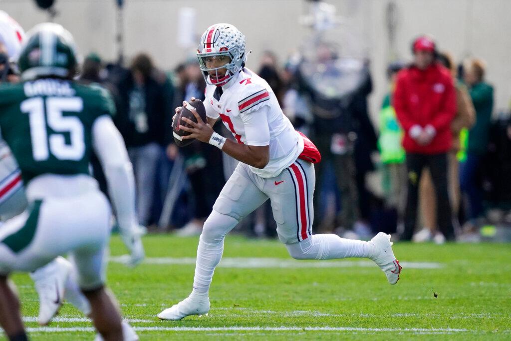 Ohio State quarterback C.J. Stroud looks downfield during the first half of an NCAA college football game against Michigan State in East Lansing, Mich., on Oct. 8, 2022. (Carlos Osorio/AP Photo)