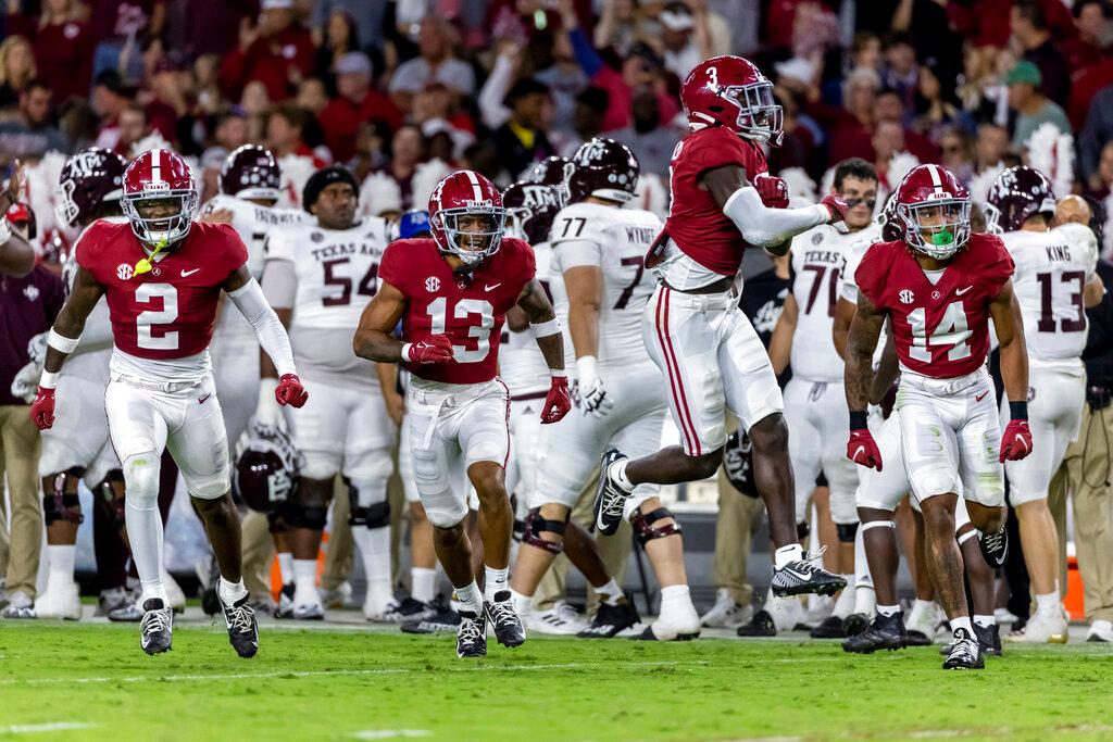 Alabama defensive back Terrion Arnold (3) celebrates his interception during the first half of the team's NCAA college football game against Texas A&M in Tuscaloosa, Ala., on Oct. 8, 2022. (Vasha Hunt/AP Photo)