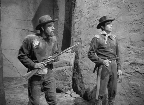 Trooper Kebussyan (Lon Chaney, Jr., L) and Capt. Richard Lance (Gregory Peck), in “‘Only the Valiant.” (Warner Bros)