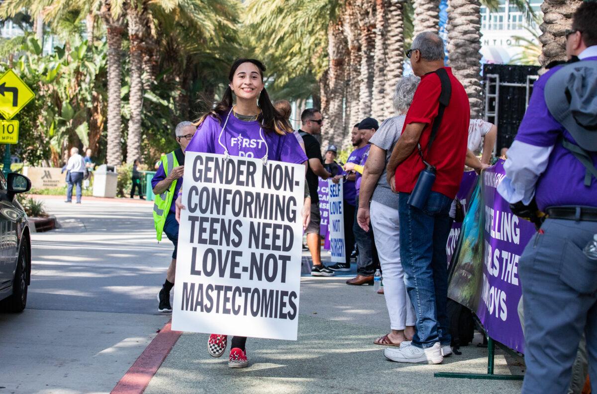 Chloe Cole takes part in a demonstration against "gender-affirming care" for minors in Anaheim, Calif., on Oct. 8, 2022. (John Fredricks/The Epoch Times)