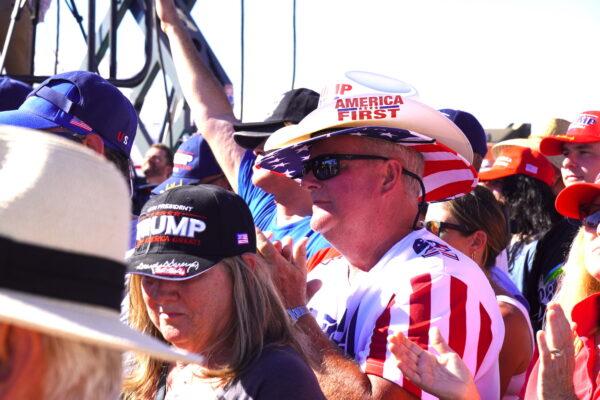 Supporters of former President Donald Trump stand in the blazing afternoon sun during Trump's third "America First" rally in Mesa, Ariz., on Oct. 9. (Allan Stein/The Epoch Times)