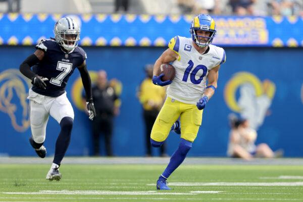 Cooper Kupp (10) of the Los Angeles Rams runs for a touchdown after catching a pass against Trevon Diggs (7) of the Dallas Cowboys during the second quarter at SoFi Stadium in Inglewood, Calif., on Oct. 9, 2022. (Sean M. Haffey/Getty Images)