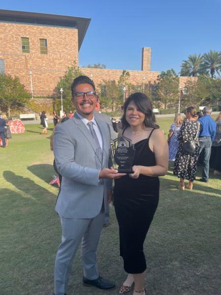 Joanna Fermin and Edgar Garnica, founders of the Youth Centers of Orange win the Orange Chamber of Commerce's “Nonprofit of the Year” award in Orange, Calif., on Oct. 7. 2022. (Carol Cassis/The Epoch Times)