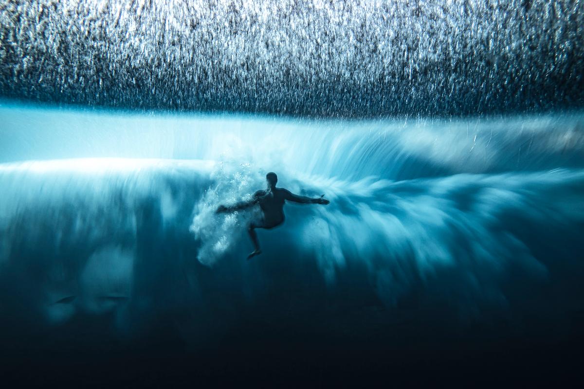 A surfer battles with the underwater turbulence created by the "heaviest wave in the world," Teahupo'o. (Coutersy of Ben Thouard)