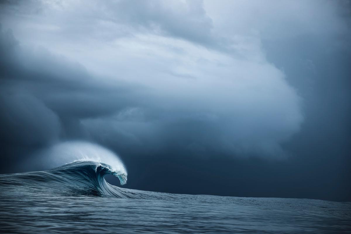 A solitary wave breaks in the final moments before a storm rolls in. (Courtesy of Ben Thouard)