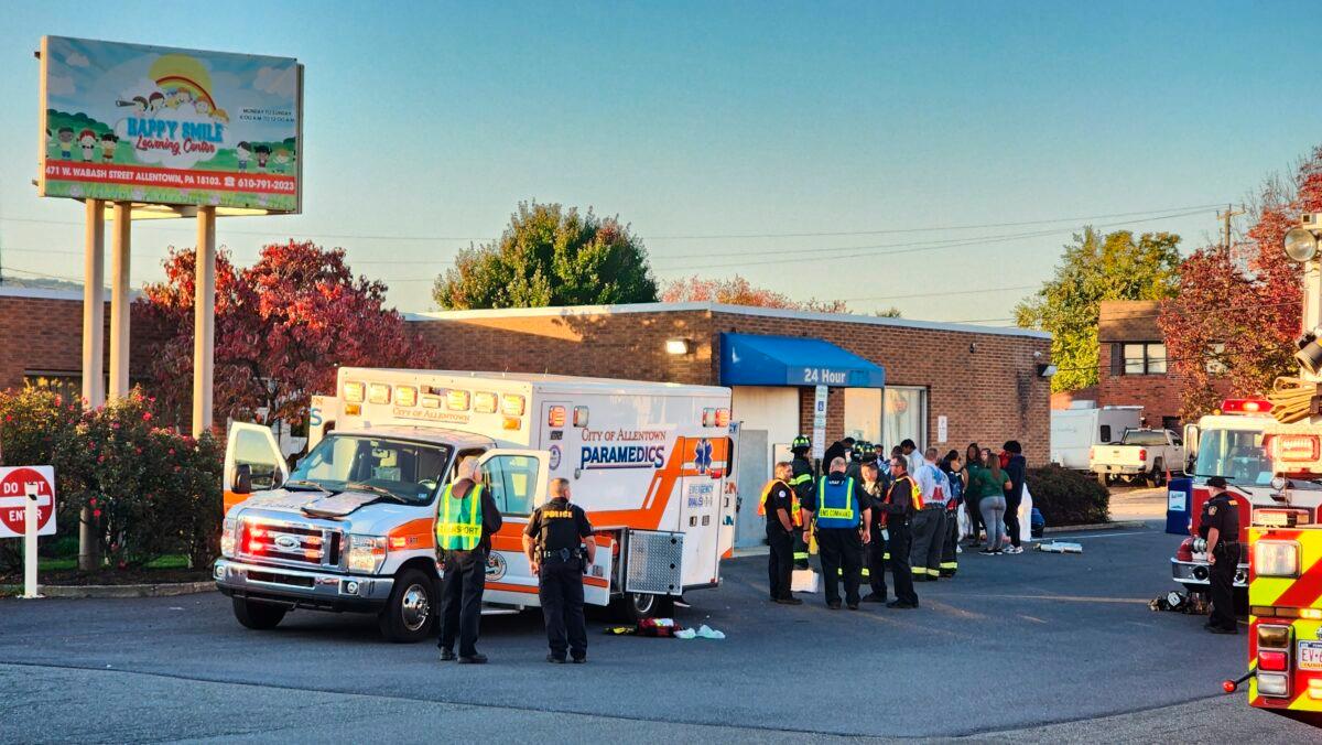 Emergency responders work on the scene of a carbon monoxide leak at a day care center in Allentown, Pa., on Oct. 11, 2022. (Zach DeWever/WFMZ-TV via AP)