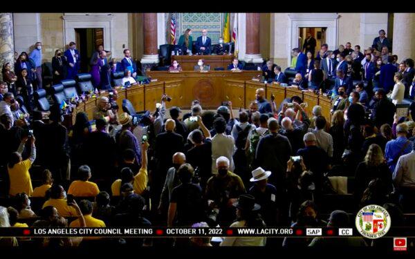 After the Oct. 9, 2022 leak of a racially charged conversation between council President Nury Martinez and three other local officials, protesters flooded the John Ferraro Council Chamber at the Los Angeles City Hall during the City Council's regular meeting on Oct. 11, 2022. (Screenshot via YouTube/LACityClerk)