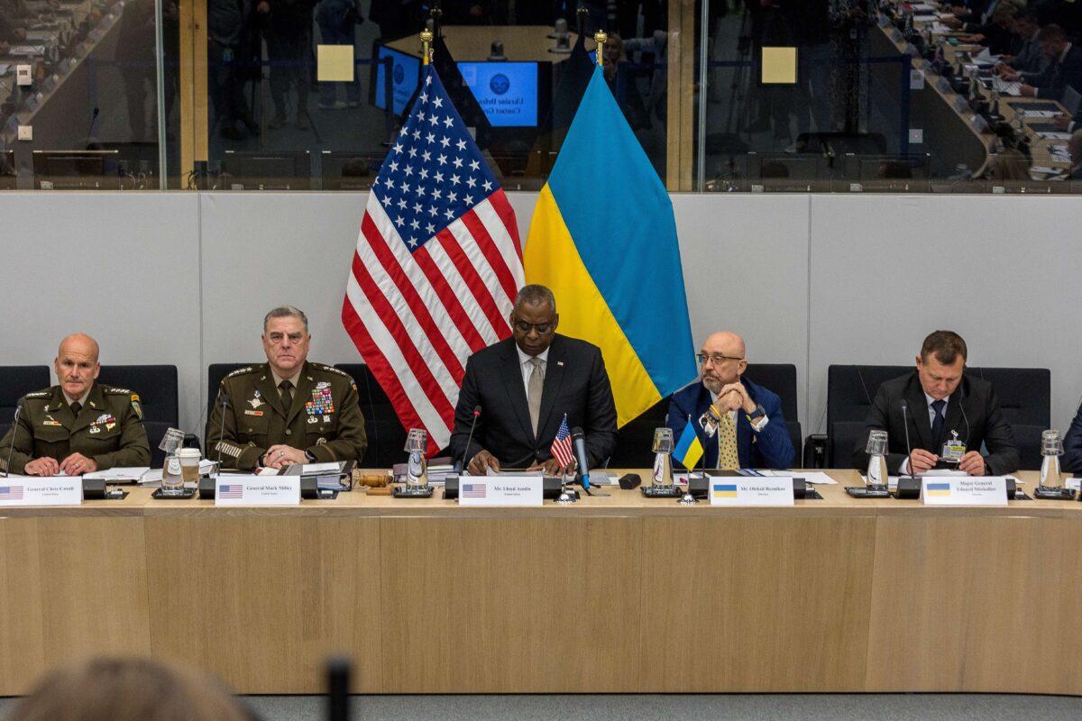 U.S. Defense Secretary Lloyd J. Austin III (C) addresses the Ukraine defense contact group meeting at NATO headquarters during the first of two days of defense ministers' meetings in Brussels on Oct. 12, 2022. (Omar Havana/Getty Images)