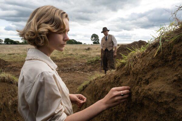 Edith Pretty (Carey Mulligan) owns farmland where she would like Basil Brown (Ralph Fiennes) to dig for archeological treasure that she believes is buried there. (Netflix)