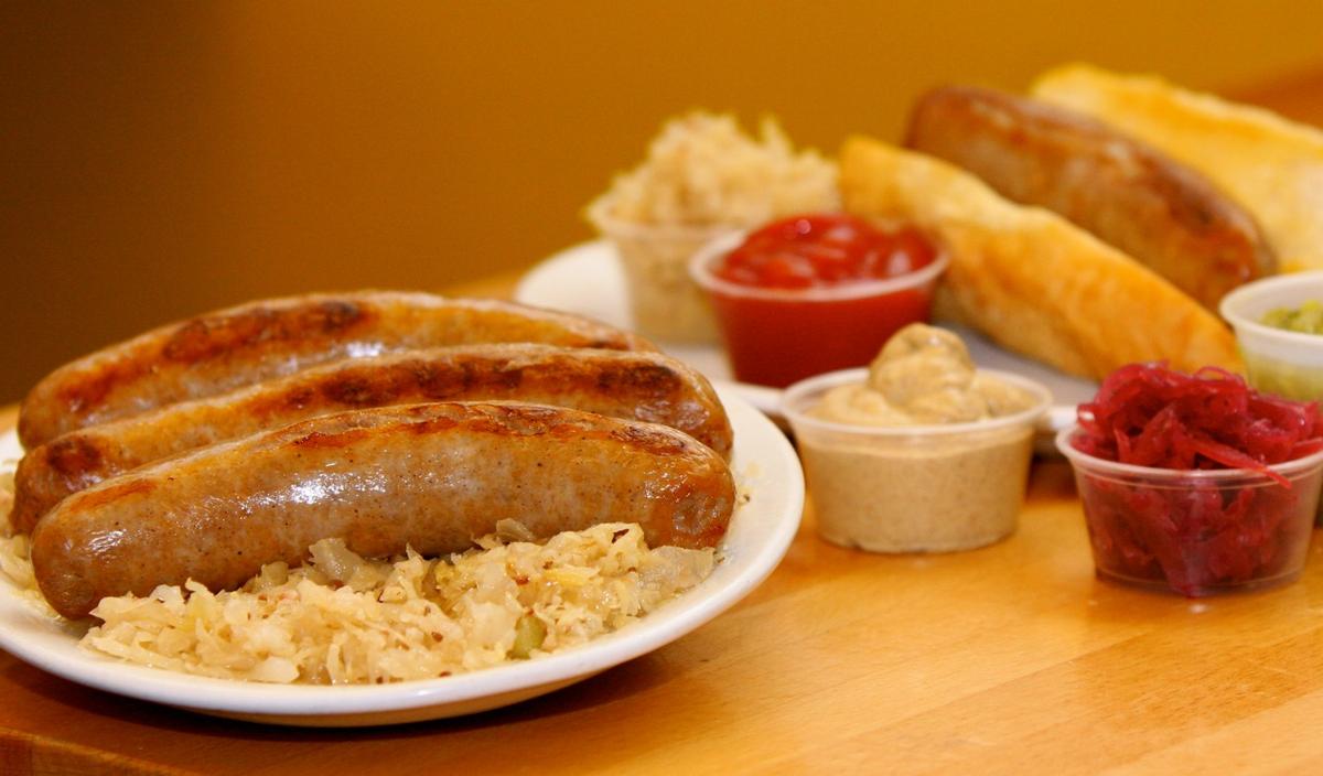 An Usinger's brat, served in a bun with sauerkraut and condiments. (Courtesy of Usinger's)