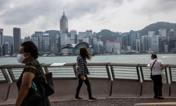 Hong Kong Reduces COVID Measures as Its International Shine Dims