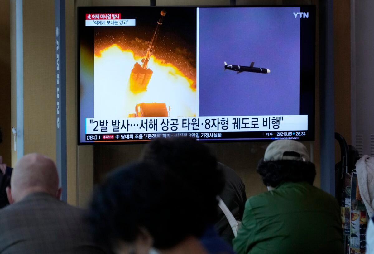 A TV screen shows file images of North Korea's missile launch during a news program at the Seoul Railway Station in Seoul, South Korea, on Oct. 13, 2022. (Ahn Young-joon/AP Photo)