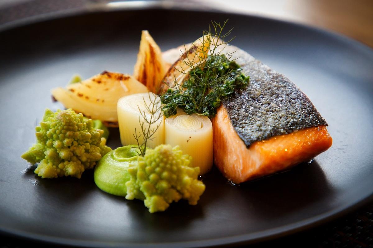 Alaskan sockeye salmon with romanesco from the garden, roasted fennel, leeks, and sea lettuce. (Courtesy of Within the Wild)