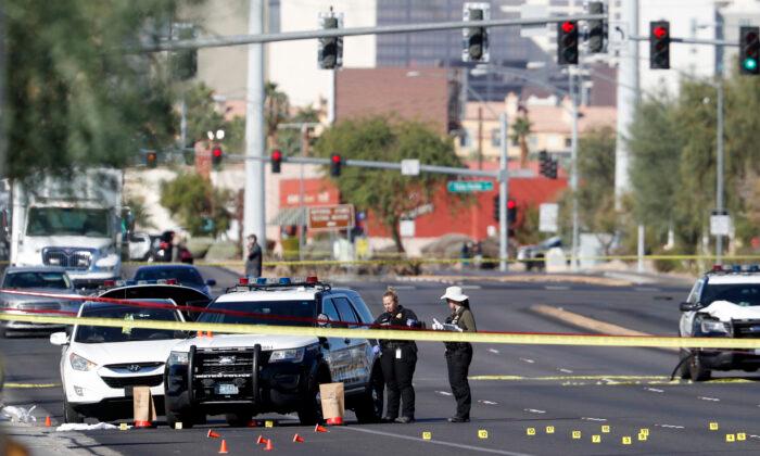 Officials: Vegas Patrol Officer Fatally Shot; Suspect Held