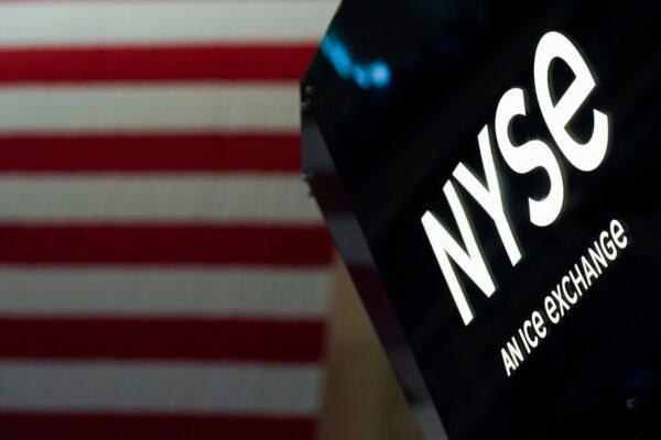 An NYSE sign is seen on the floor at the New York Stock Exchange in New York, on June 15, 2022. (Seth Wenig/AP Photo)