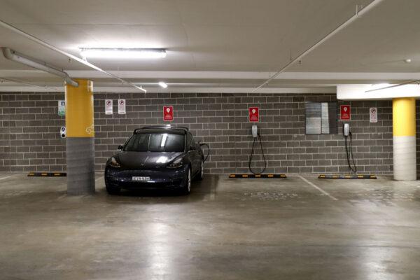 A Tesla Model Y charges at a EV charge station in Sydney, Australia, on Jan. 19, 2021. (Brendon Thorne/Getty Images)