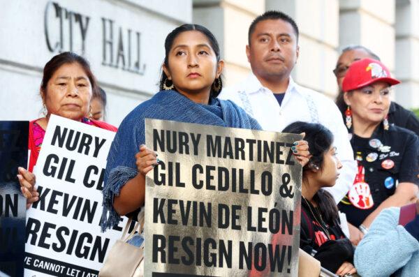 Protestors demonstrate outside City Hall calling for the resignations of L.A. City Council members Kevin de Leon and Gil Cedillo in the wake of a leaked audio recording in Los Angeles, Calif., on Oct. 12, 2022. (Mario Tama/Getty Images)
