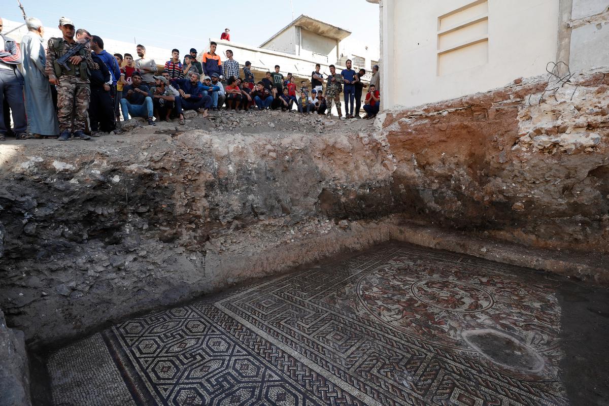 Syrian officials said the mosaic is the most important archaeological discovery since the Syrian conflict began 11 years ago. (Omar Sanadiki/AP Photo)