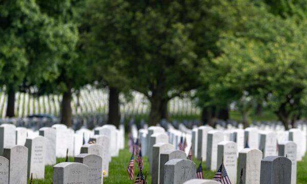 Headstones with American flags are seen at Arlington National Cemetery in Arlington, Va., on May 30, 2022. (Tasos Katopodis/Getty Images)