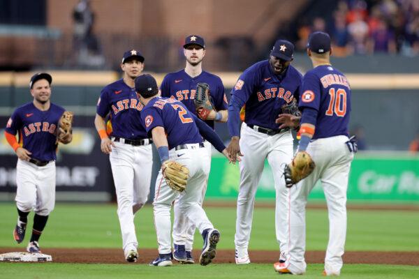 Alex Bregman (2) and Yordan Alvarez (44) of the Houston Astros celebrate after defeating the Seattle Mariners in game two of the American League Division Series at Minute Maid Park in Houston, on October 13, 2022. (Carmen Mandato/Getty Images)