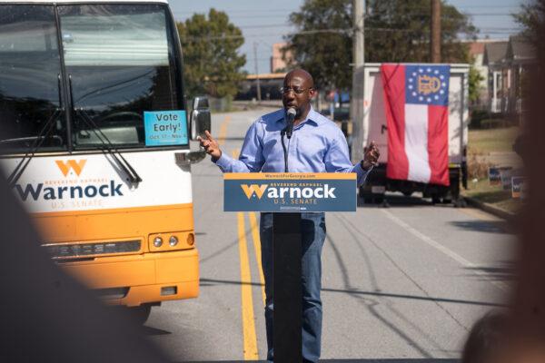 Sen. Rev. Raphael Warnock speaks to supporters during his campaign tour, outside the Liberty Theater in Columbus, Ga. on Oct. 8, 2022. (Megan Varner/Getty Images)