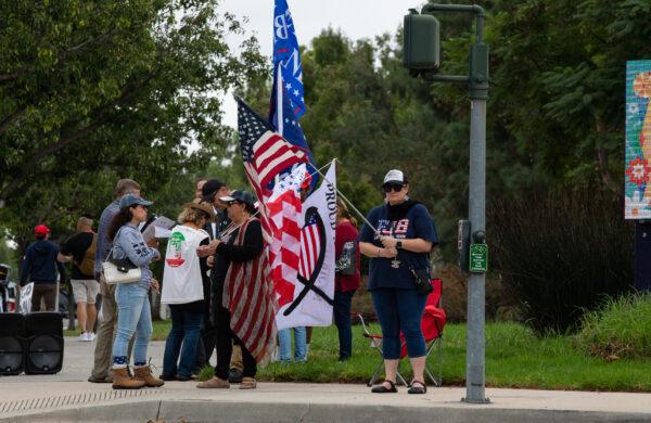 People protest the visit of President Joe Biden in Irvine, Calif., on Oct. 14, 2022. (John Fredricks/The Epoch Times)