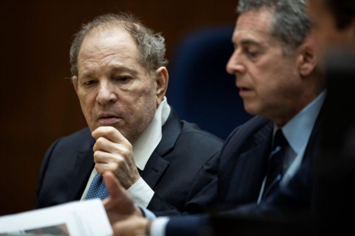 Former film producer Harvey Weinstein (L), interacts with his attorney Mark Werksman in court at the Clara Shortridge Foltz Criminal Justice Center in Los Angeles on Oct. 4 2022. (Etienne Laurent via AP)