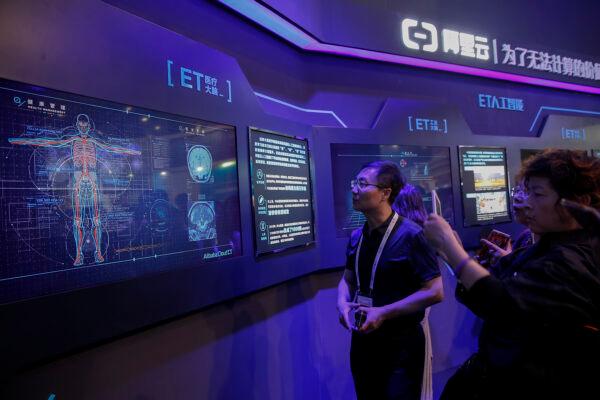 Members of the public visit a data analysis center during the 2017 China International Big Data Industry Expo at Guiyang International Eco-Conference Center in Guiyang, China, on May 27, 2017. (Lintao Zhang/Getty Images)