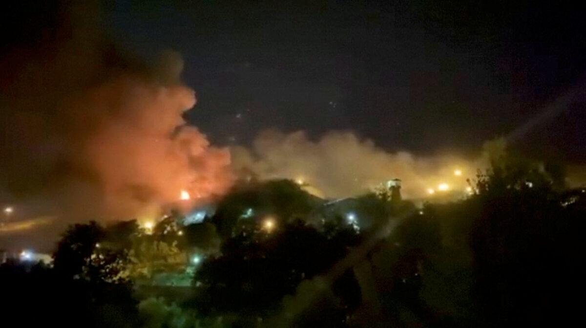 Smoke rising from Evin Prison in Tehran, Iran, on Oct. 15, 2022, in this still image take from a video obtained by Reuters. (Reuters)