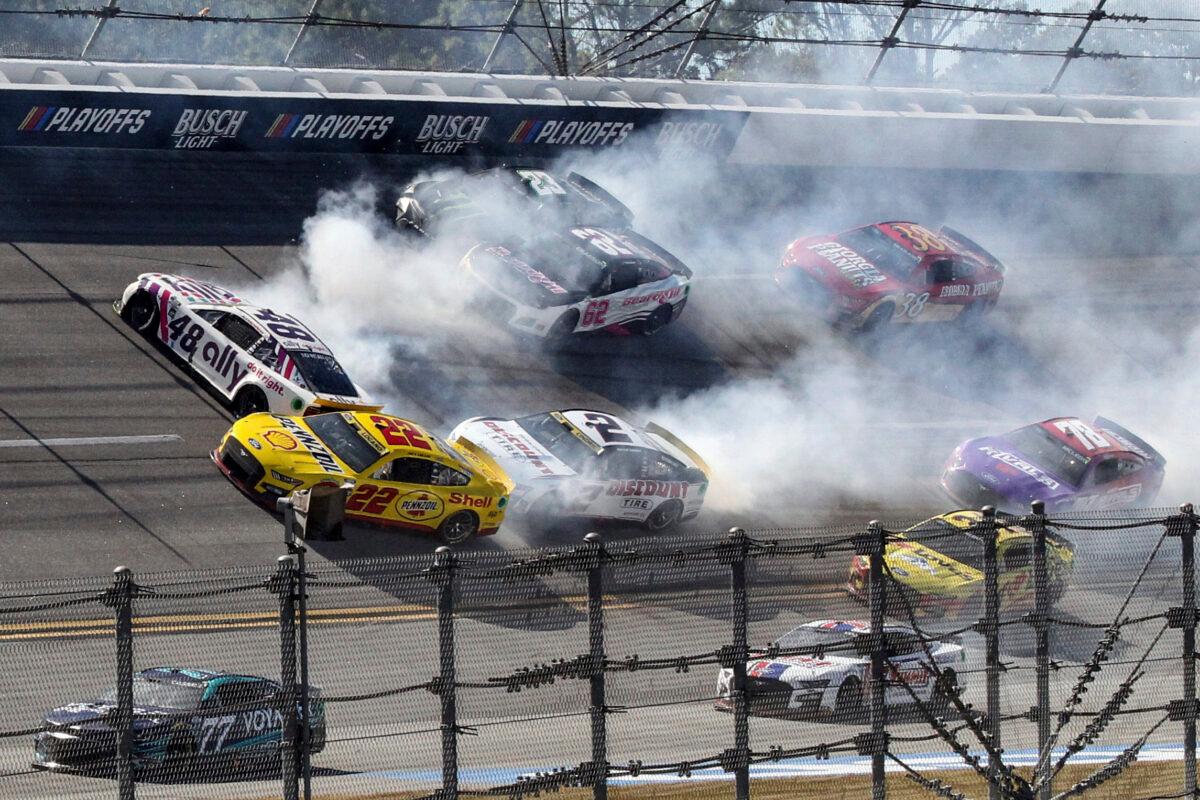 Alex Bowman (48), Joey Logano (22), Austin Cindric (2), Justin Allgaier (62) and Ty Gibbs (23) are involved in a crash in Turn 1 during a NASCAR Cup Series auto race in Talladega, Ala., on Oct. 2, 2022. (Skip Williams/AP Photo)