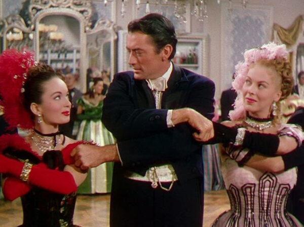 (L–R) Ann Blyth as Countess Marina Selanova, Gregory Peck as Capt. Jonathan Clark, and Andrea King as Mamie in “The World in His Arms.” (Universal-International)