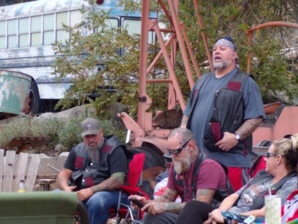 Mike "Big Mike" Cameron, founder of the Ascendants Motorcycle Club in Phoenix, addresses club members during the annual family gathering in Jerome, Ariz., on Oct. 15, 2022. (Allan Stein/The Epoch Times)