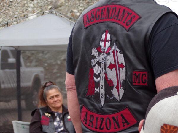 An Ascendants Motorcycle Club member displays the club colors at a gathering in Jerome, Ariz., on Oct. 15, 2022. (Allan Stein/The Epoch Times)