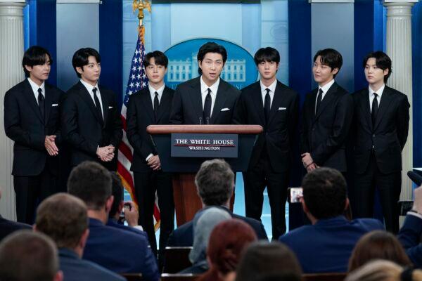 RM (C), accompanied by other K-pop group BTS members (L–R) V, Jungkook, Jimin, Jin, J-Hope, and Suga, speaks during the daily briefing at the White House in Washington on May 31, 2022. (Evan Vucci/AP Photo)