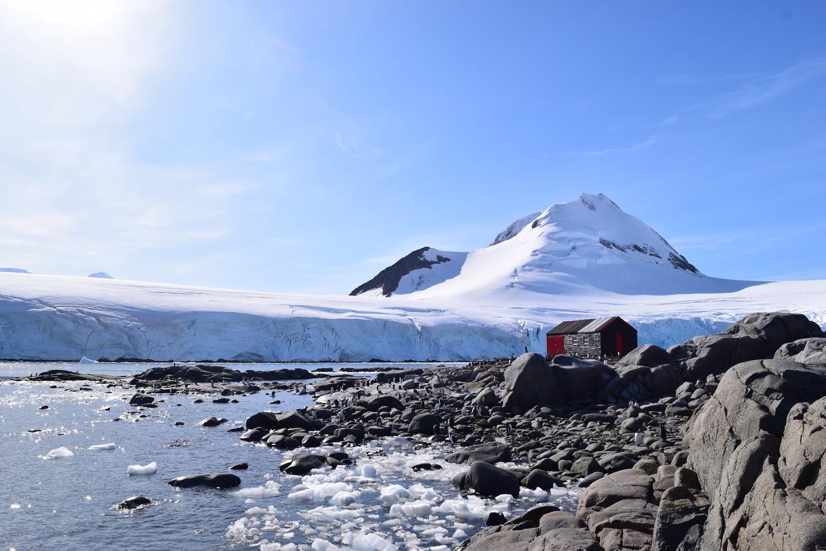 The post office seen situated on the rocky shores of Goudier Island, Antarctica. (Courtesy of <a href="https://ukaht.org/">UK Antarctic Heritage Trust</a>)
