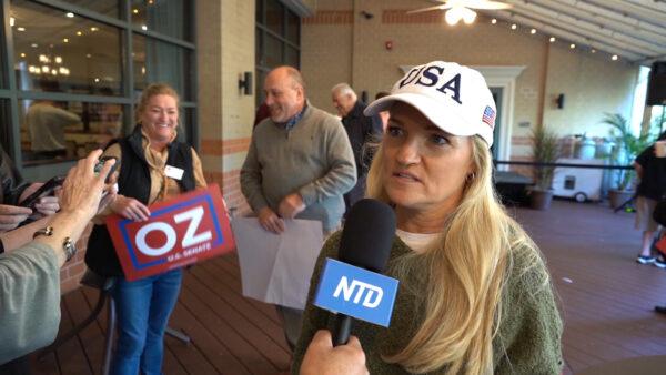 Julie Brown is interviewed at a rally for Dr. Oz in Malvern, Pa., on Oct. 15, 2022. (William Huang/The Epoch Times)