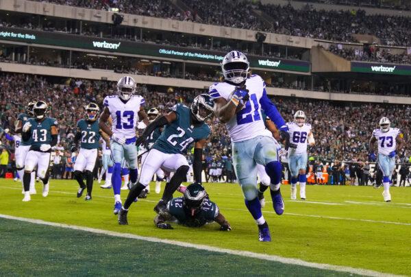 Ezekiel Elliott (21) of the Dallas Cowboys runs into the end zone for a rushing touchdown in the third quarter of the game against the Philadelphia Eagles at Lincoln Financial Field, in Philadelphia, on Oct. 16, 2022. (Mitchell Leff/Getty Images)