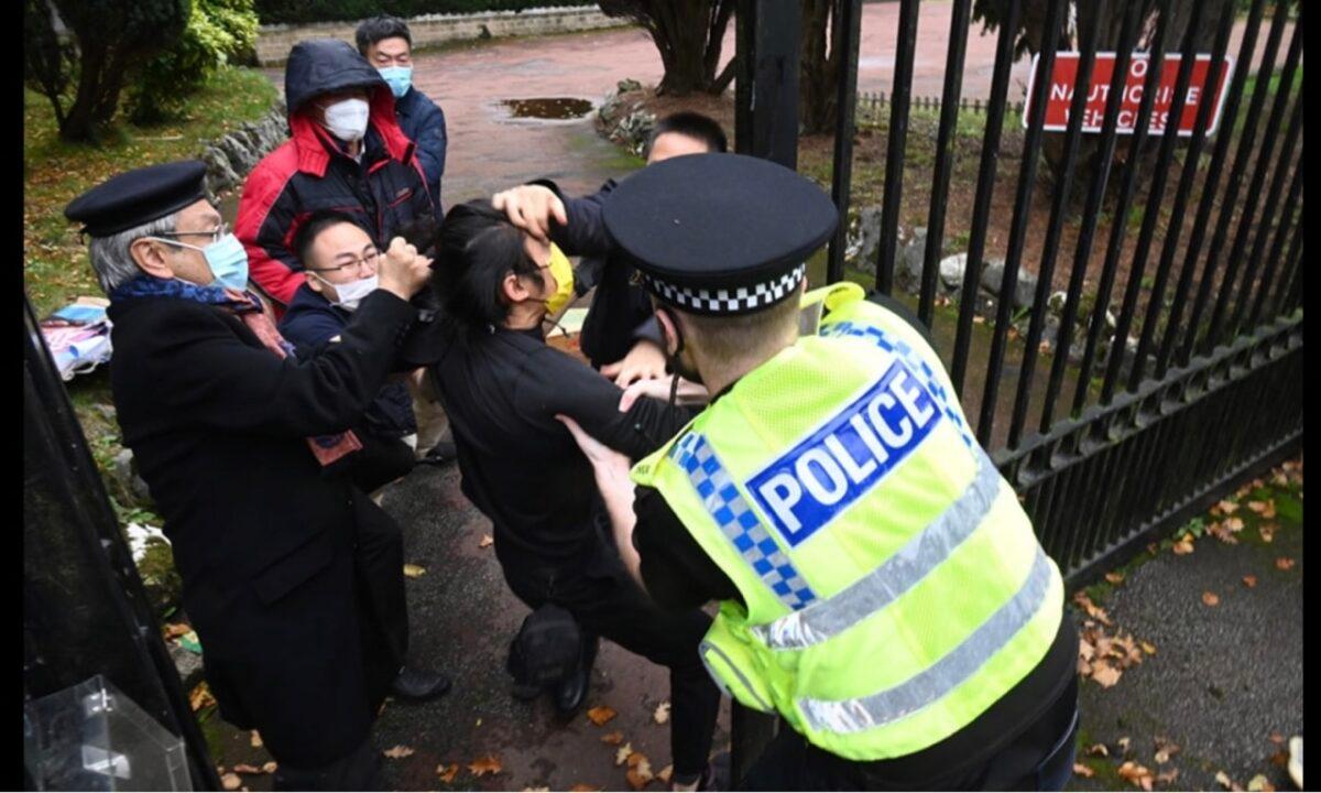 Hongkongers holding a rally outside the Chinese Consulate in Manchester, UK, were dragged into the consulate and beaten by the staff, on Oct. 16, 2022. (Screenshot via Hong Kong Indigenous Defense Force)