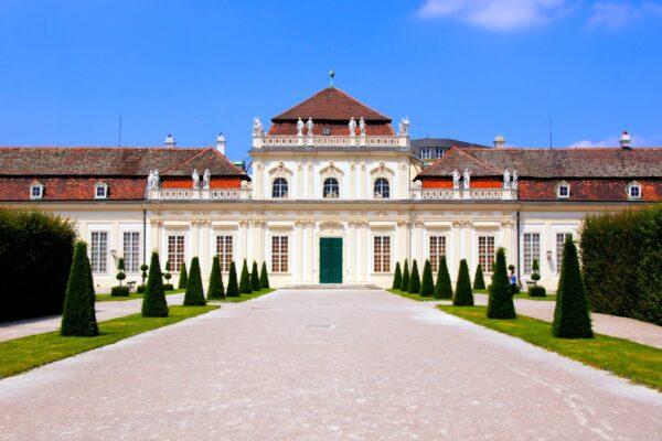 In contrast, the Lower Belvedere palace has a simpler appearance, with a white single-story façade of 35 bays and straight wings around a courtyard. It faces the garden and has the general appearance of an orangery, a fashionable conservatory which protects citrus fruit trees during winter. Indeed, it has an orangery, though over the years this has been converted into stables in 1805, the Museum of Medieval Art in 1952, and an exhibition space in 2007. (<a href="https://www.shutterstock.com/g/jenifoto7">JeniFoto</a>/<a href="https://www.shutterstock.com/image-photo/view-through-grounds-lower-belvedere-palace-187247711">Shutterstock</a>)