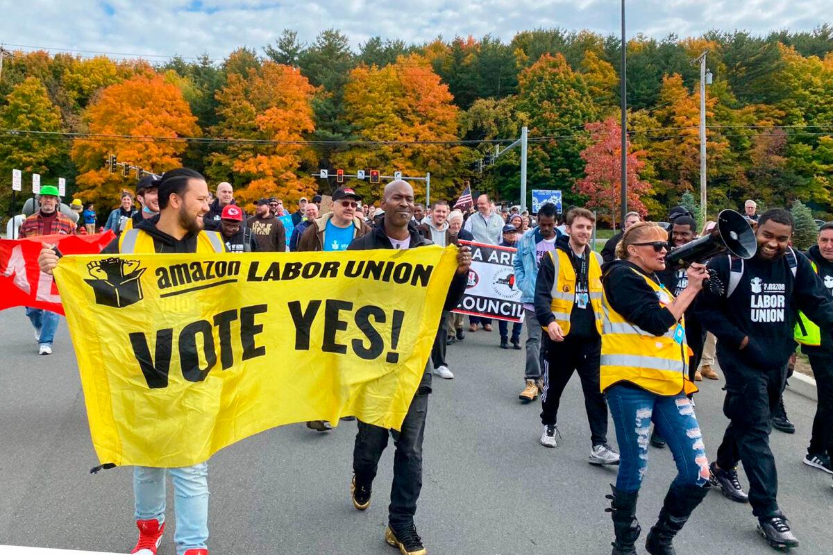 Amazon workers and supporters march during a rally in Castleton-On-Hudson, about 15 miles south of Albany, N.Y., on Oct. 10, 2022. (Rachel Phua via AP)