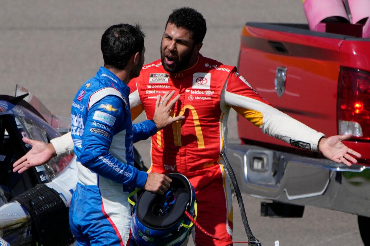 Bubba Wallace (R) argues with Kyle Larson after the two crashed during a NASCAR Cup Series auto race in Las Vegas on Oct. 16, 2022. (John Locher/AP Photo)