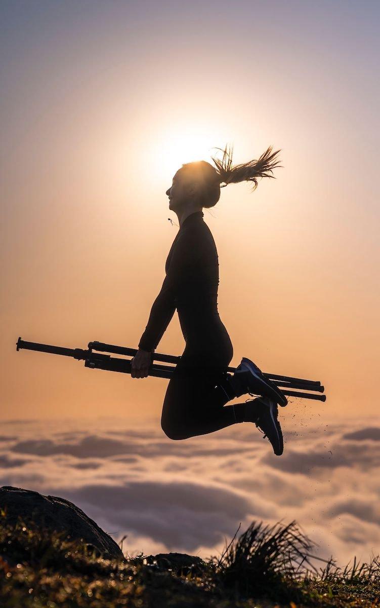 Billy often shoots unique works "on the spot," such as this model using a tripod as a broom, creating the effect of flying over a sea of clouds at the highest peak in Hong Kong. (Courtesy of Billy Lie)